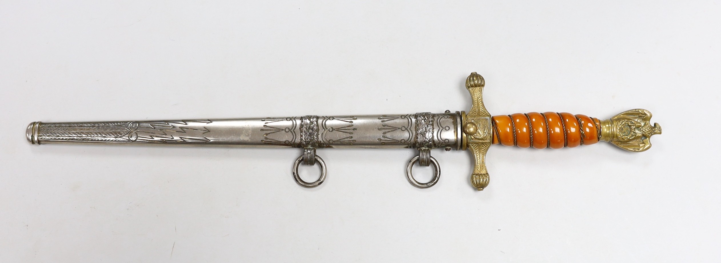 A German Third Reich Kriegsmarine Officers dagger, by Eickhorn, Solingen, with associated German Third Reich scabbard 41.5 cm